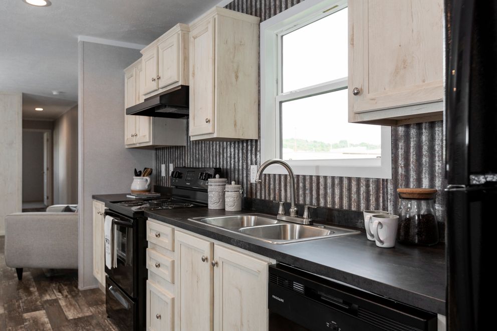 The SAPPHIRE Kitchen. This Manufactured Mobile Home features 3 bedrooms and 2 baths.