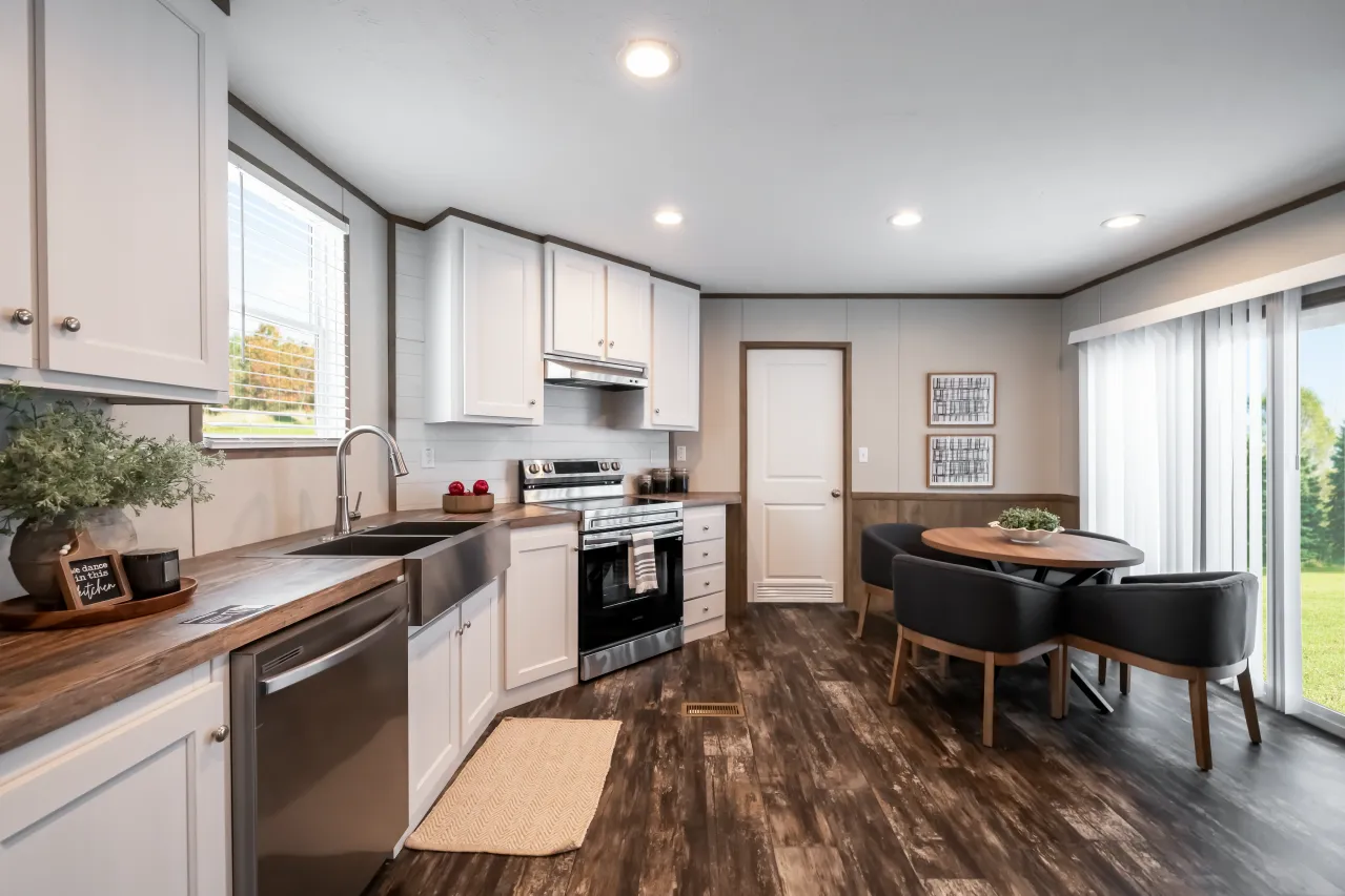 The ANNIVERSARY ENTERTAINER Exterior. This Manufactured Mobile Home features 3 bedrooms and 2 baths.