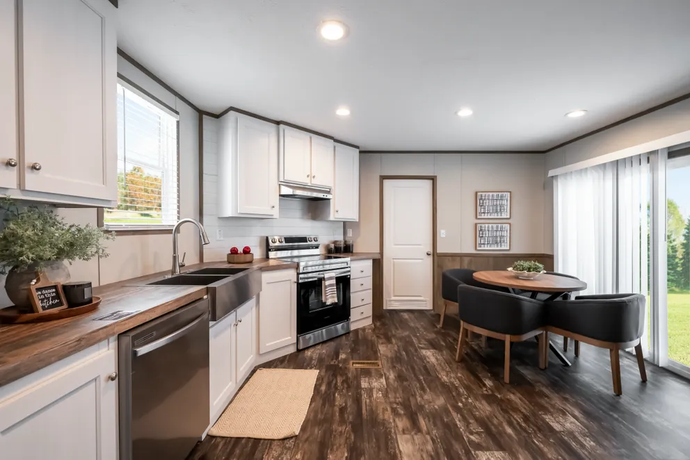 The ANNIVERSARY ENTERTAINER Exterior. This Manufactured Mobile Home features 3 bedrooms and 2 baths.
