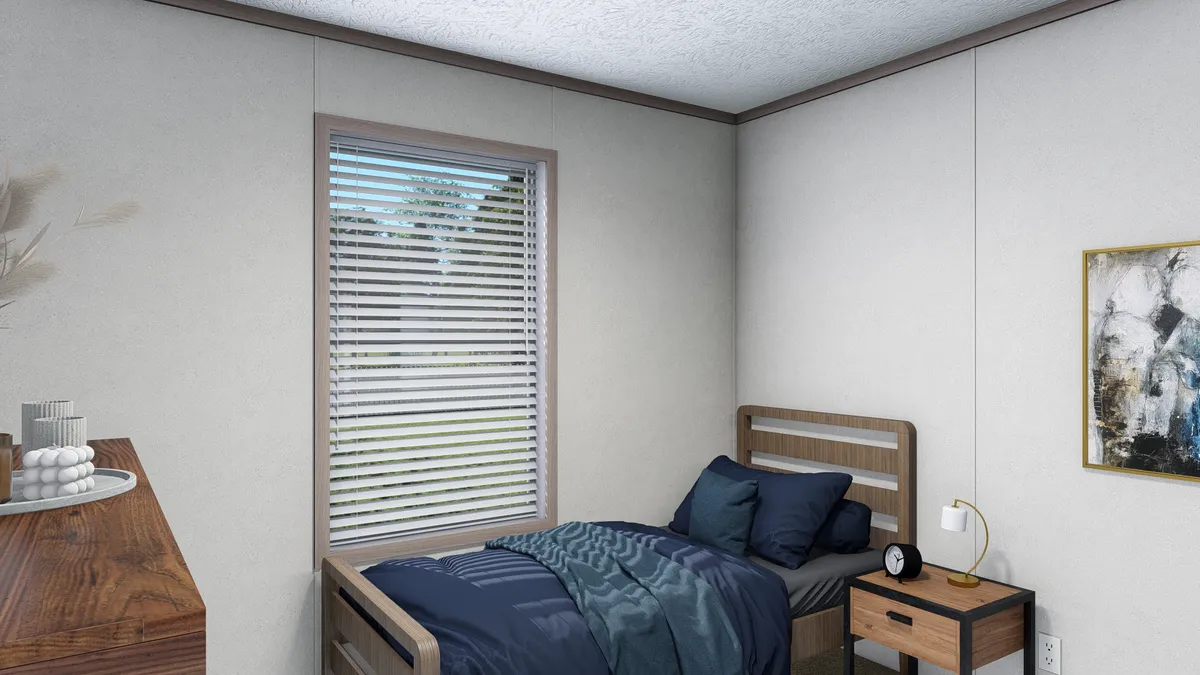 The 5624-E744 THE PULSE Guest Bedroom. This Manufactured Mobile Home features 3 bedrooms and 2 baths.