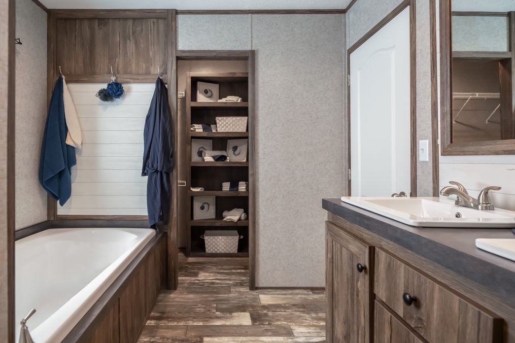 The LIBERTY Primary Bathroom. This Manufactured Mobile Home features 3 bedrooms and 2 baths.