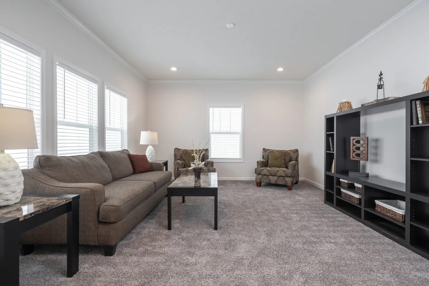 The 4872 ENTERPRISE 32X76 MODULAR Family Room. This Modular Home features 4 bedrooms and 2 baths.