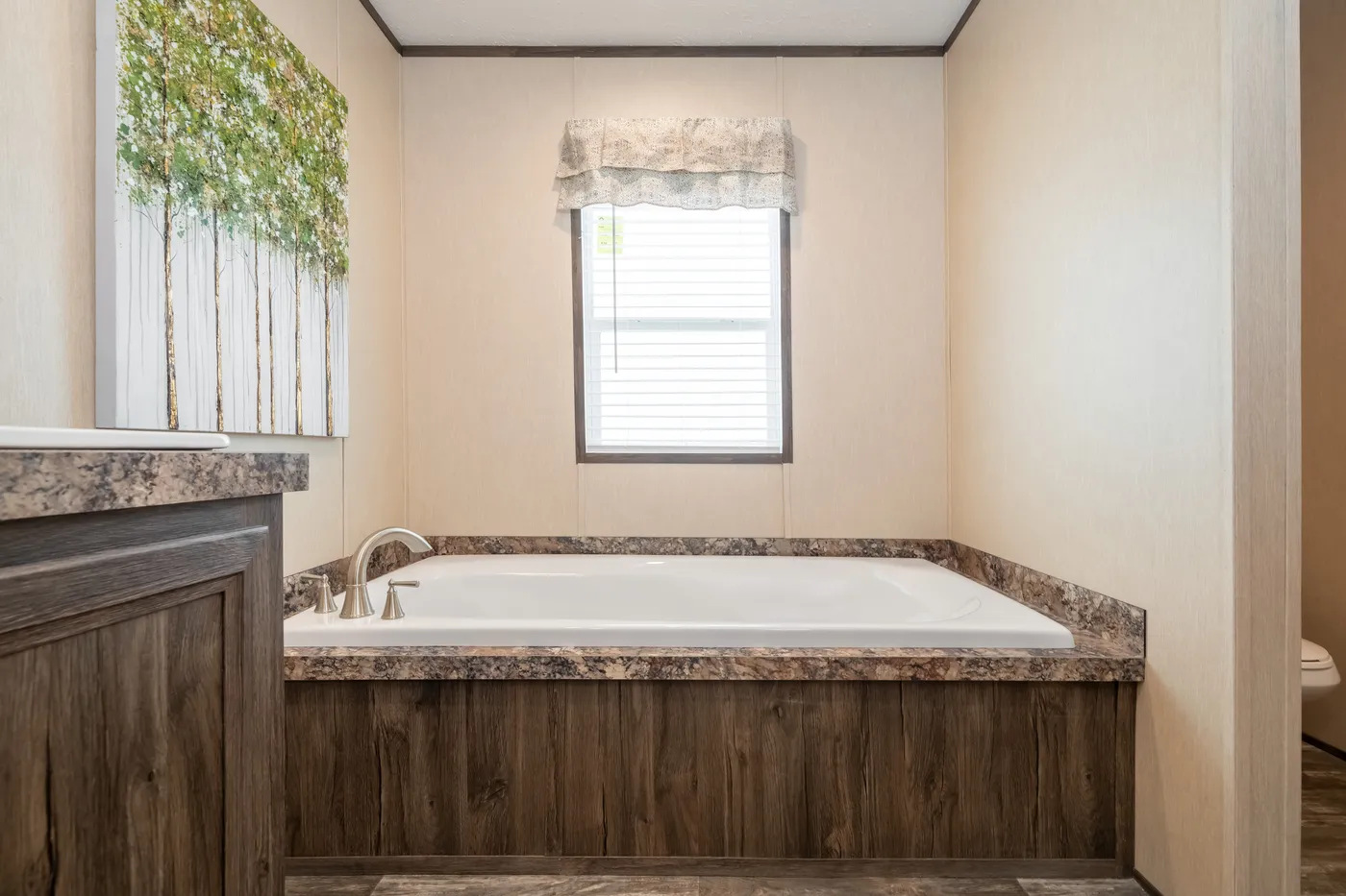 The HARDIN Primary Bathroom. This Manufactured Mobile Home features 3 bedrooms and 2 baths.