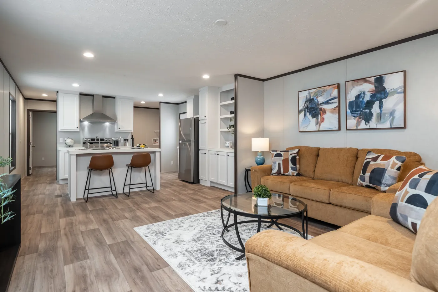 The ESSENCE Living Room. This Manufactured Mobile Home features 3 bedrooms and 2 baths.