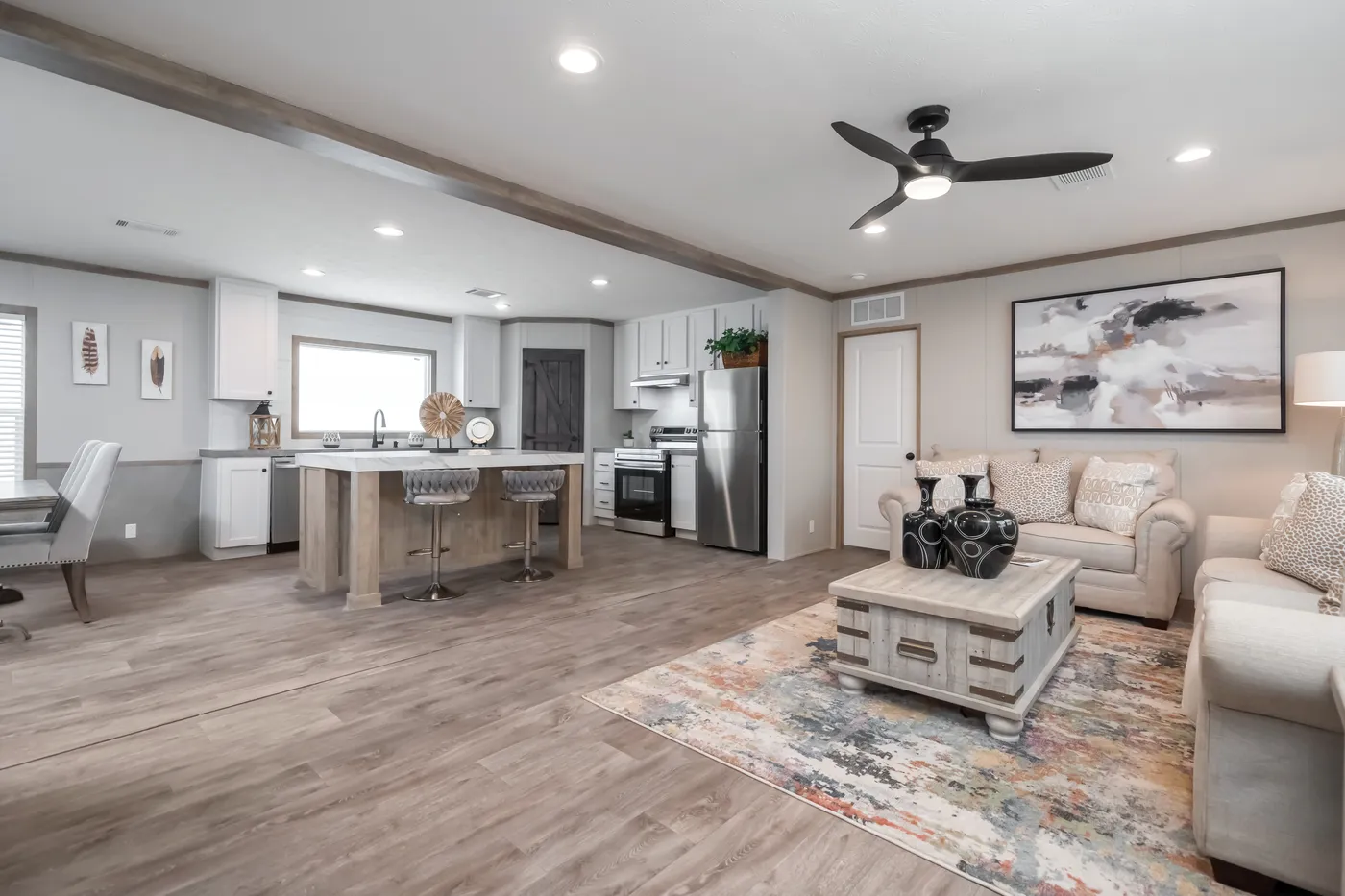 The PT 78 Living Room. This Manufactured Mobile Home features 3 bedrooms and 2 baths.