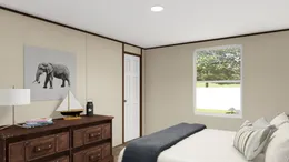 The EXCITEMENT Bedroom. This Manufactured Mobile Home features 3 bedrooms and 2 baths.