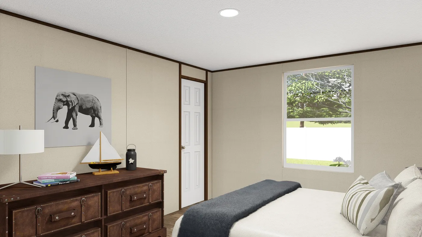 The EXCITEMENT Bedroom. This Manufactured Mobile Home features 3 bedrooms and 2 baths.
