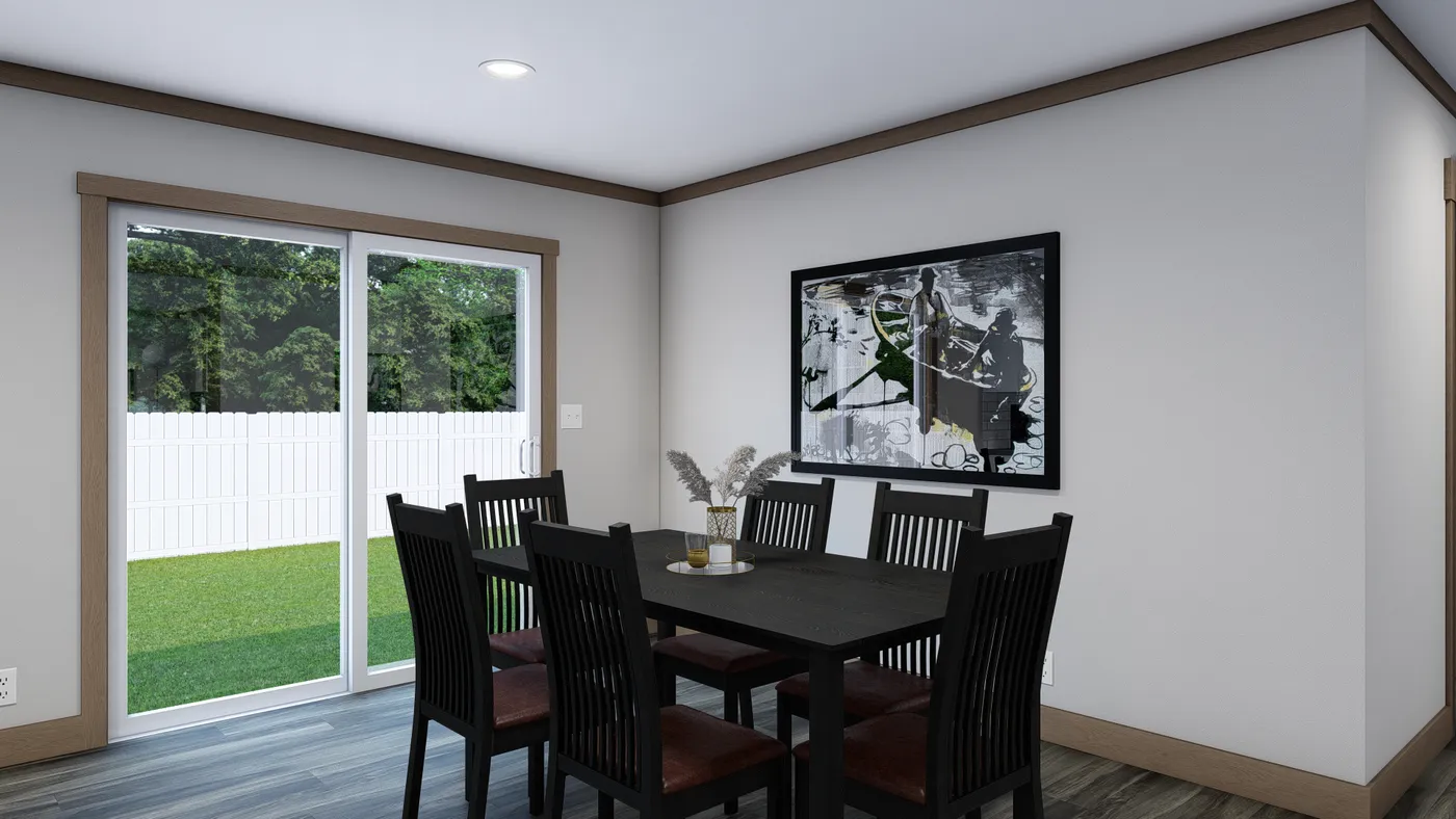 The EVERETT ELITE Dining Room. This Manufactured Mobile Home features 4 bedrooms and 3 baths.
