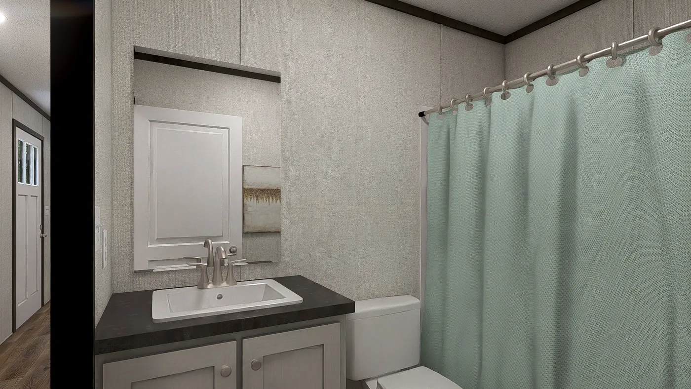 The ESSENCE Guest Bathroom. This Manufactured Mobile Home features 3 bedrooms and 2 baths.