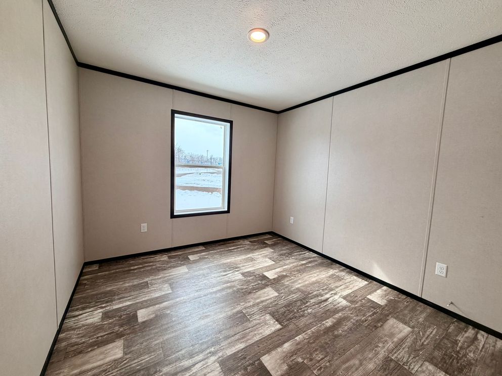 The DIAMOND Guest Bedroom. This Manufactured Mobile Home features 3 bedrooms and 2 baths.