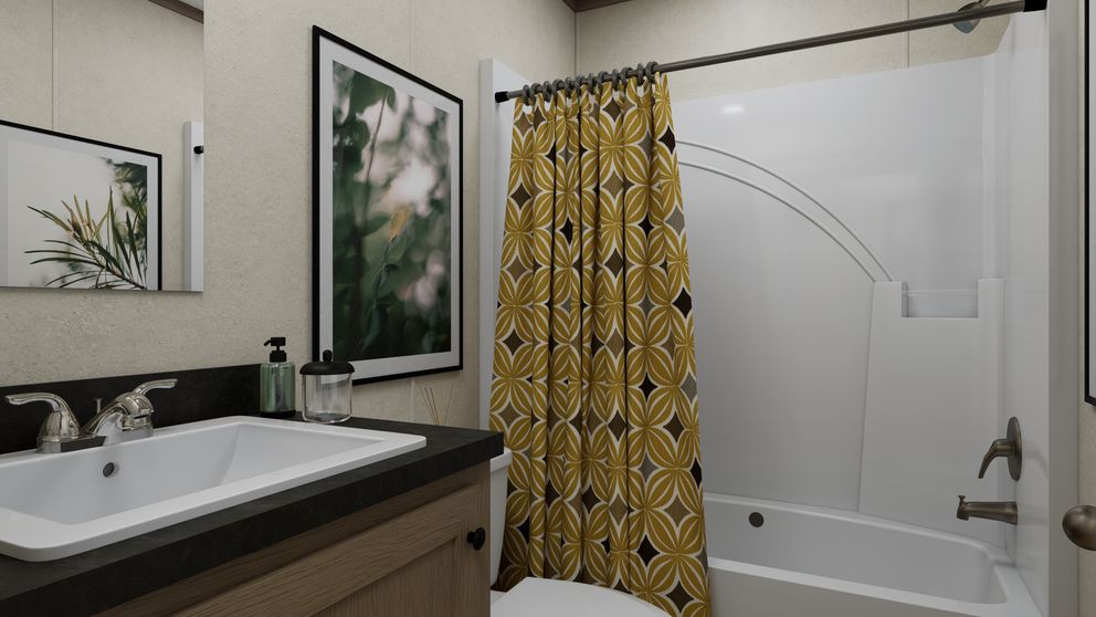 The 7016-CC03 HARBORVIEW 70 Guest Bathroom. This Manufactured Mobile Home features 3 bedrooms and 2 baths.