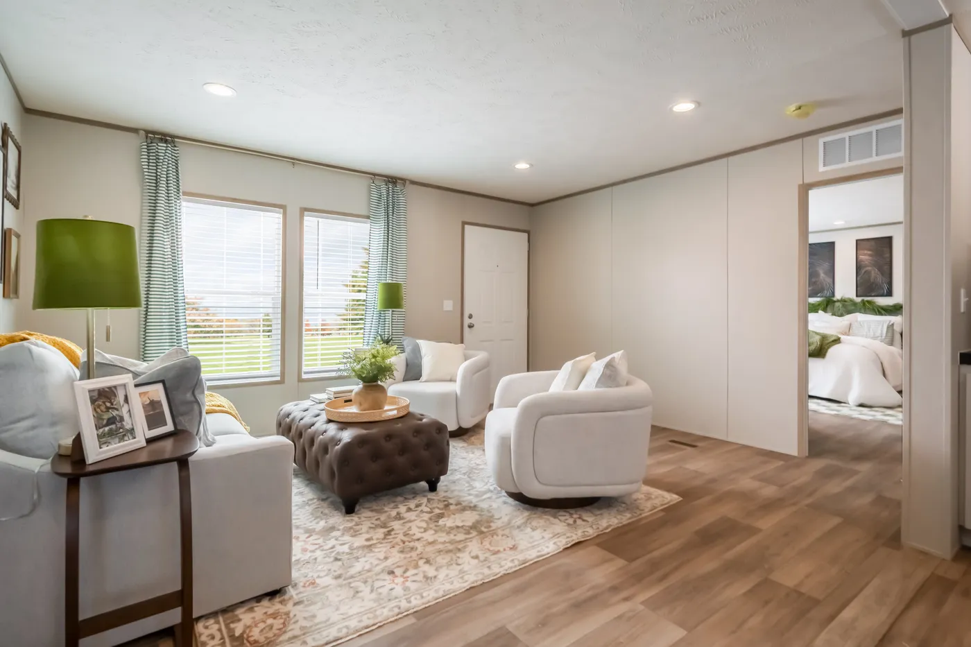 The VISTA Living Room. This Manufactured Mobile Home features 3 bedrooms and 2 baths.
