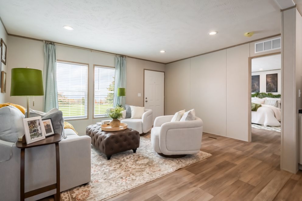 The VISTA Living Room. This Manufactured Mobile Home features 3 bedrooms and 2 baths.