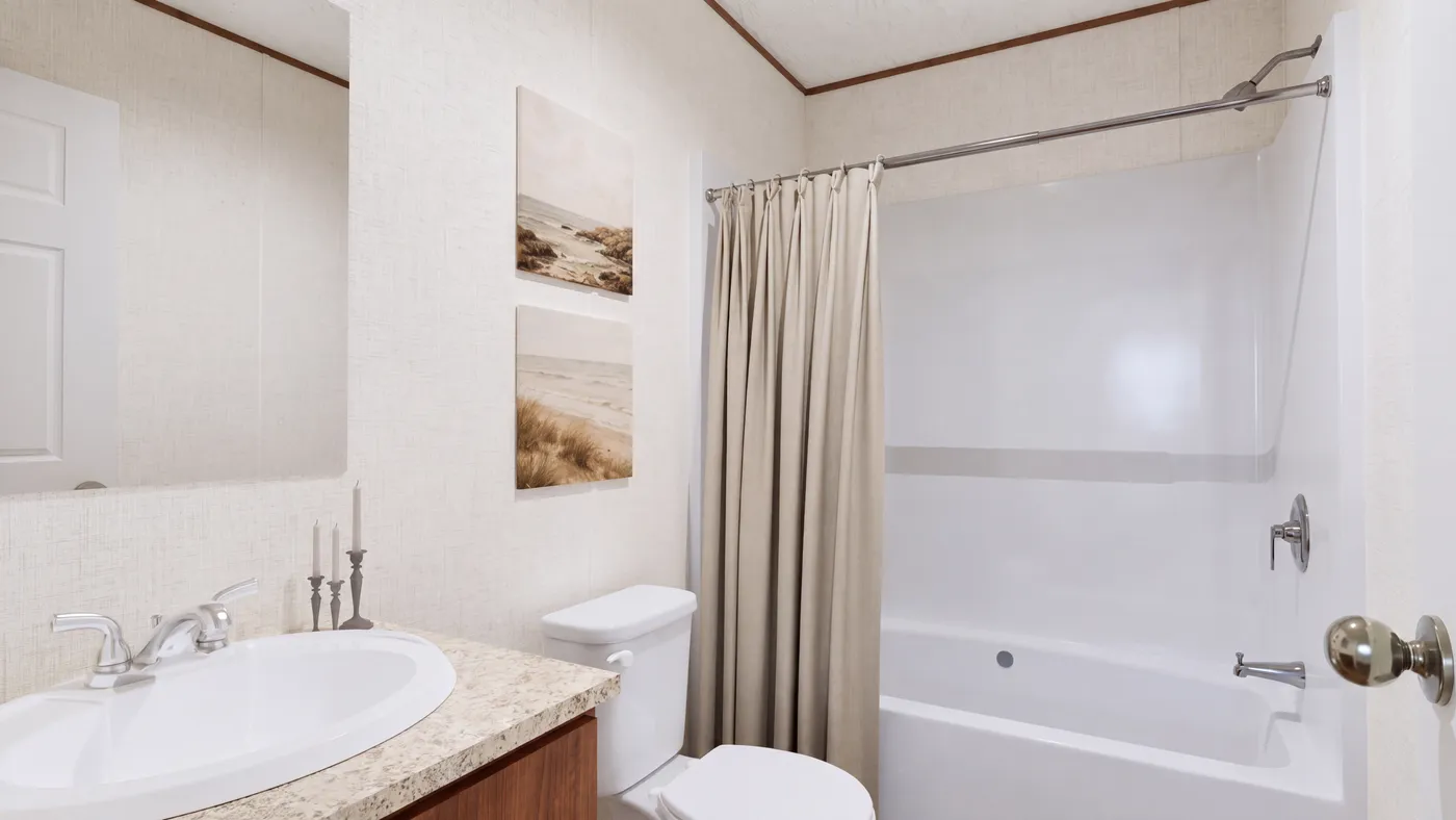 The MAGNOLIA Guest Bathroom. This Manufactured Mobile Home features 3 bedrooms and 2 baths.