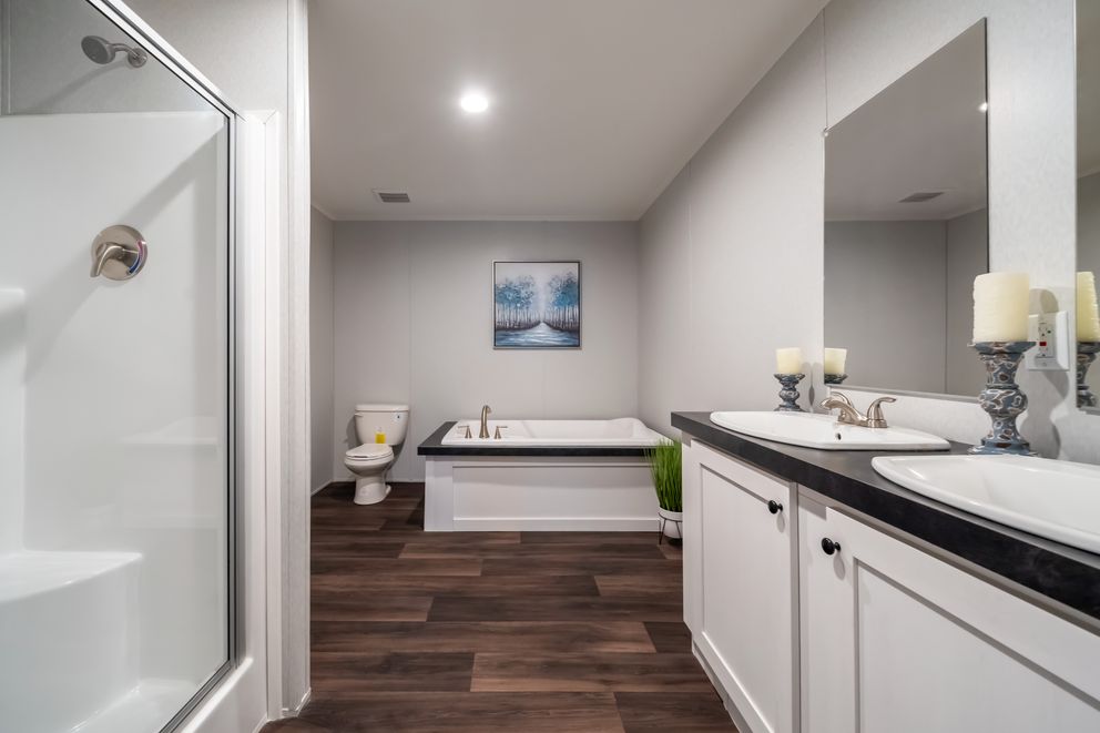 The THE EAGLE 48 Primary Bathroom. This Manufactured Mobile Home features 3 bedrooms and 2 baths.