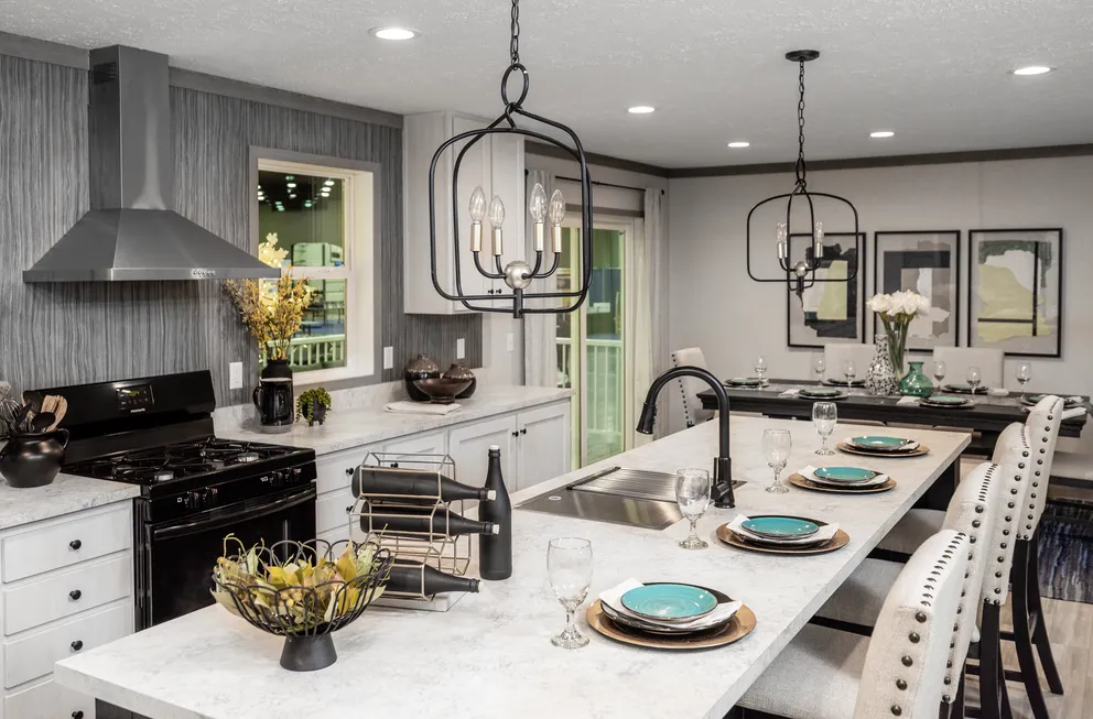 The 6428-E792 THE PULSE Kitchen. This Manufactured Mobile Home features 3 bedrooms and 2.5 baths.