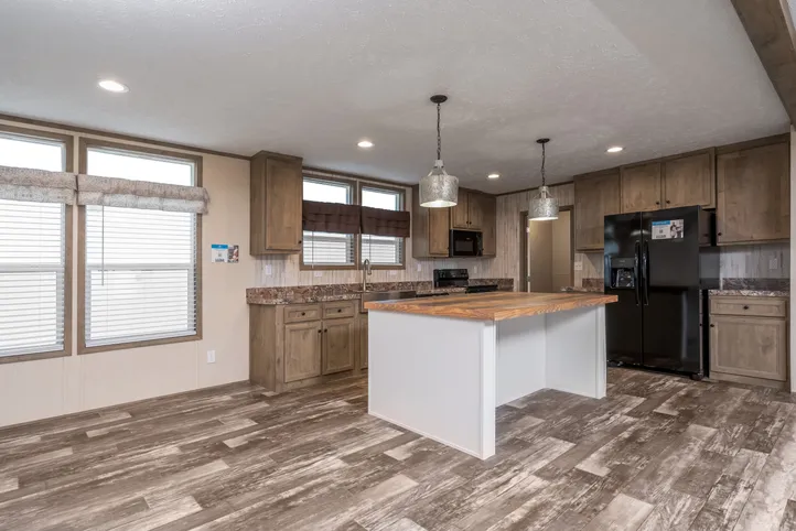 The NUMBER ONE Exterior. This Manufactured Mobile Home features 3 bedrooms and 2 baths.