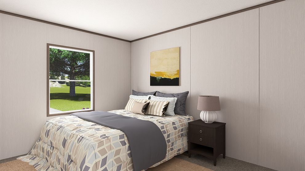 The ULTRA PRO 3 BR 28X56 Guest Bedroom. This Manufactured Mobile Home features 3 bedrooms and 2 baths.