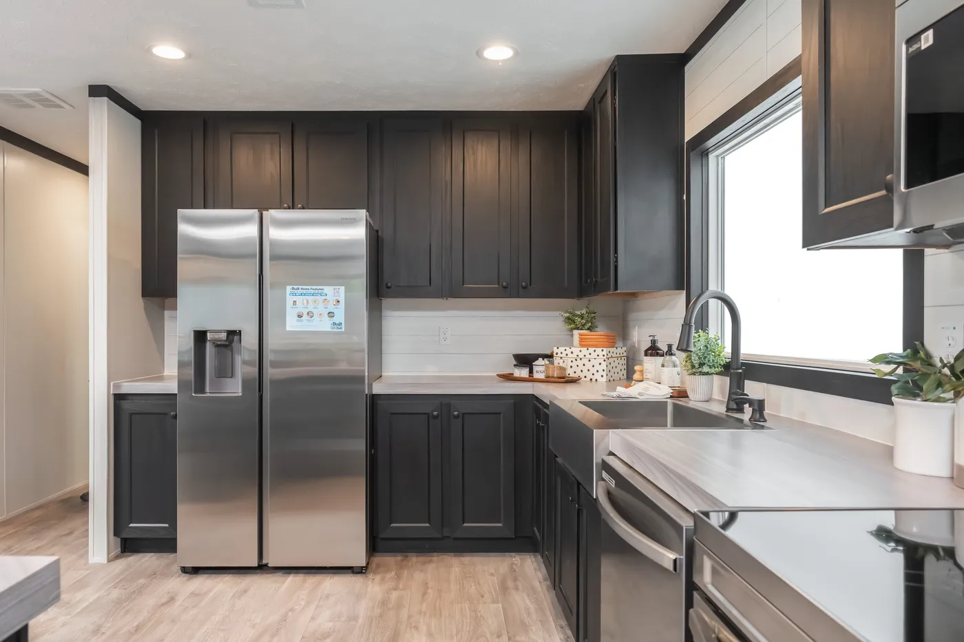 The CRAZY EIGHTS Kitchen. This Manufactured Mobile Home features 4 bedrooms and 2 baths.
