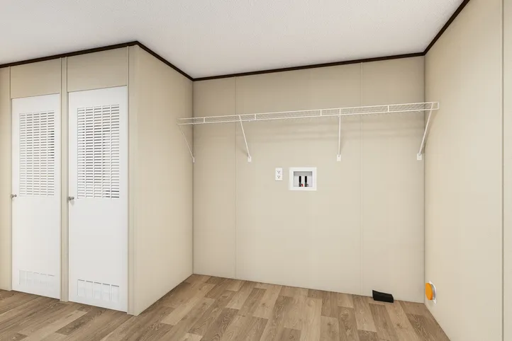 The TRIUMPH Utility Room. This Manufactured Mobile Home features 5 bedrooms and 3 baths.