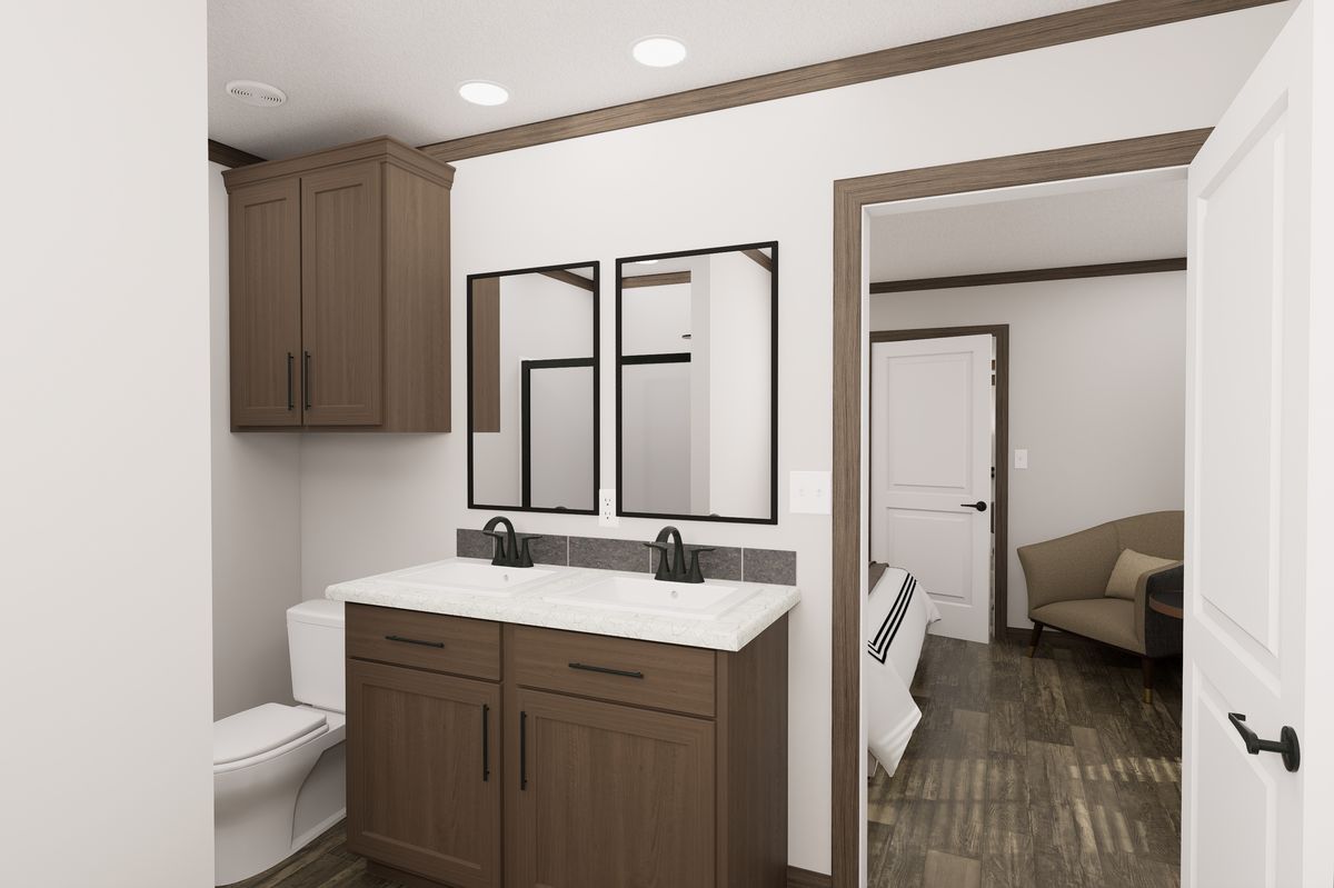 The THE TRUMAN Primary Bathroom. This Manufactured Mobile Home features 3 bedrooms and 2 baths.