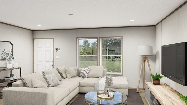 The HAVEN Living Room. This Manufactured Mobile Home features 3 bedrooms and 2 baths.