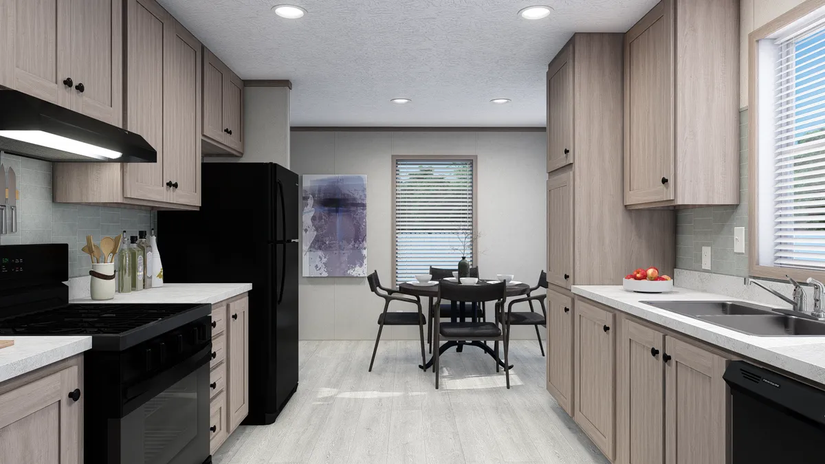 The 4824-E734 THE PULSE Kitchen. This Manufactured Mobile Home features 3 bedrooms and 2 baths.