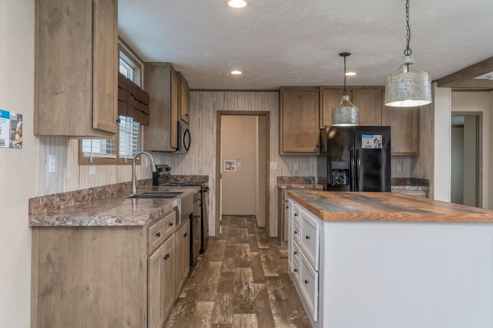 The NUMBER ONE Exterior. This Manufactured Mobile Home features 3 bedrooms and 2 baths.