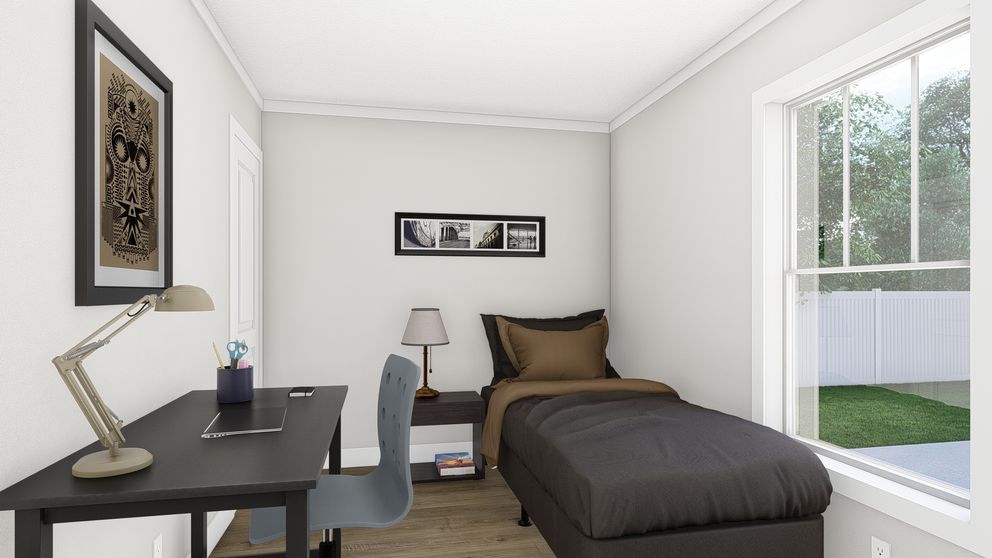 The RHYTHM NATION Guest Bedroom. This Manufactured Mobile Home features 3 bedrooms and 2 baths.