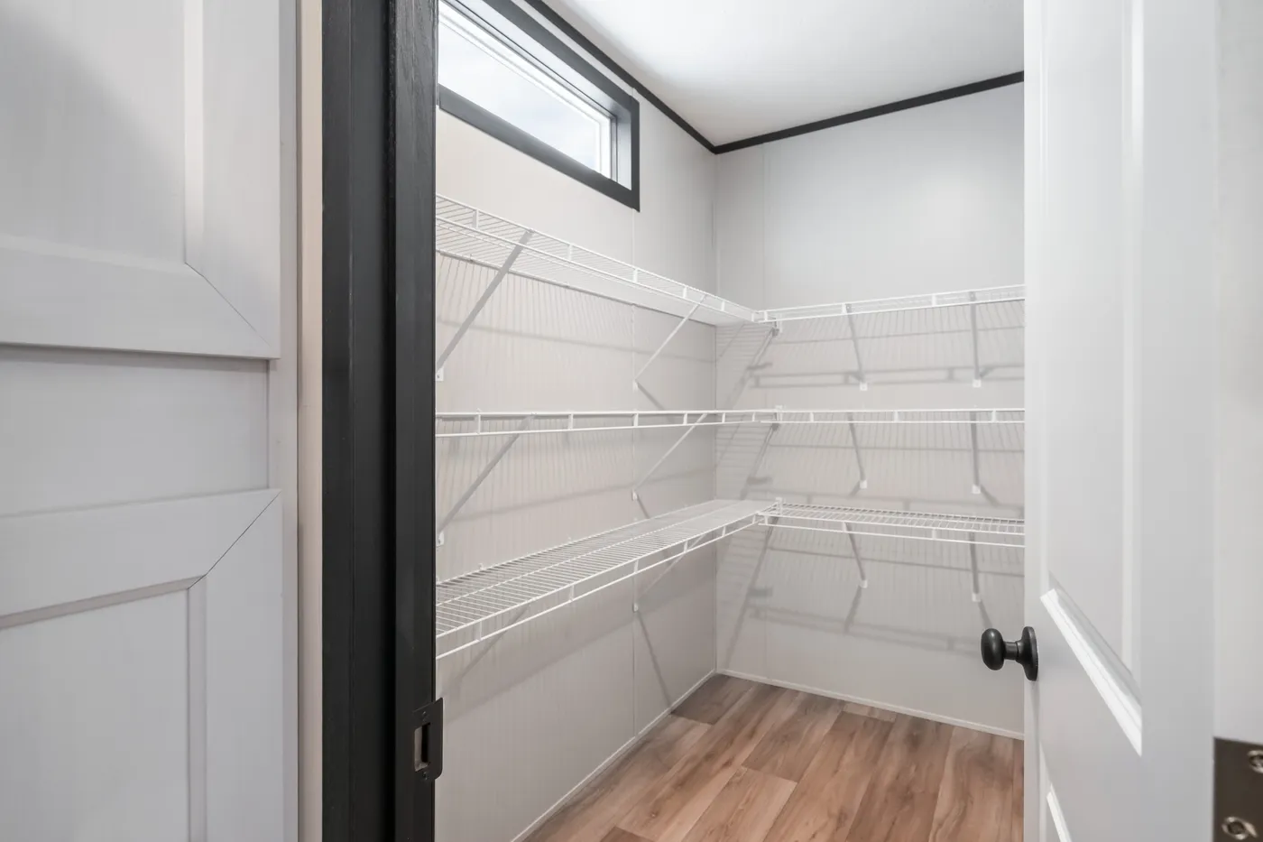 The THE ANNIVERSARY 2.1 Kitchen. This Manufactured Mobile Home features 3 bedrooms and 2 baths.