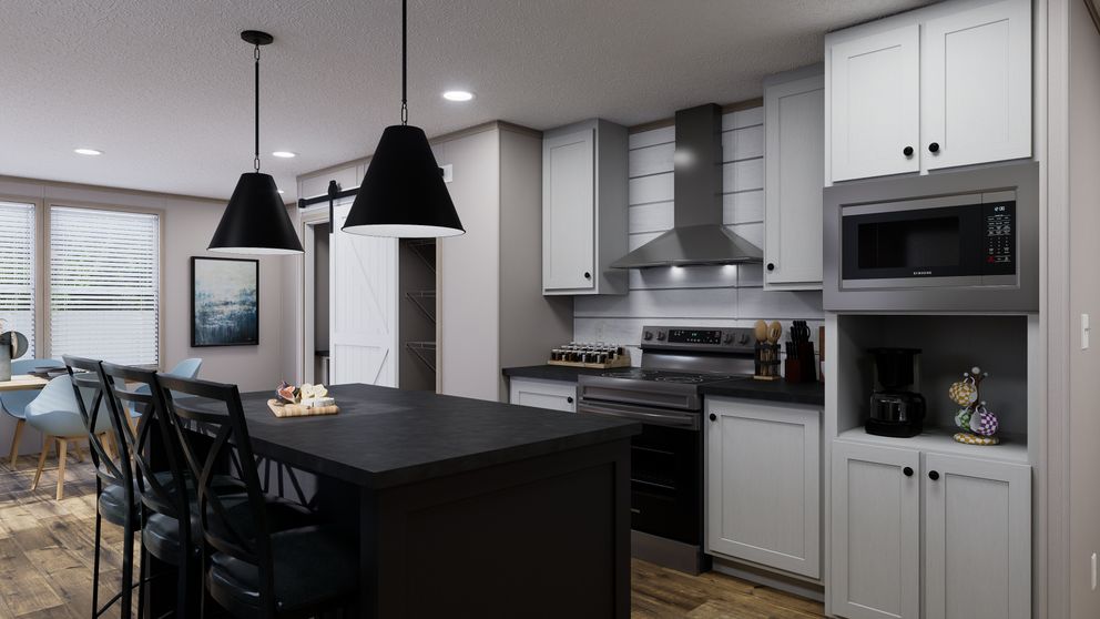 The MOUNTAIN BREEZE 3260 Kitchen. This Manufactured Mobile Home features 3 bedrooms and 2 baths.