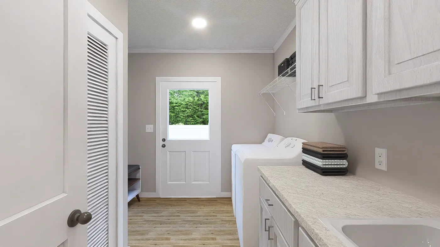 The THE HEXAGON Utility Room. This Manufactured Mobile Home features 4 bedrooms and 3 baths.