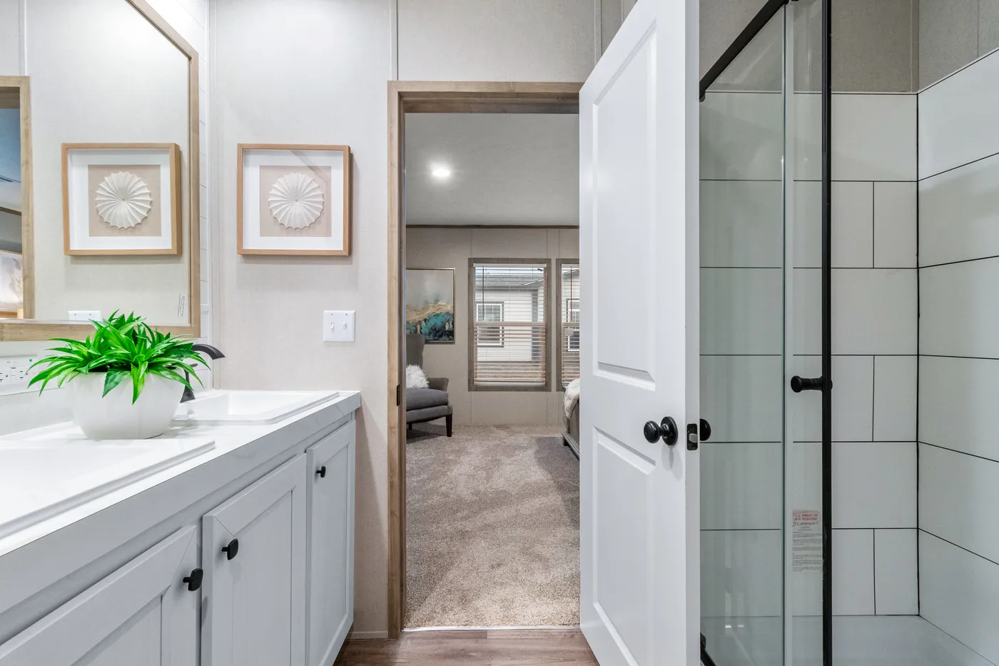 The THE CHOICE Primary Bathroom. This Manufactured Mobile Home features 4 bedrooms and 2 baths.
