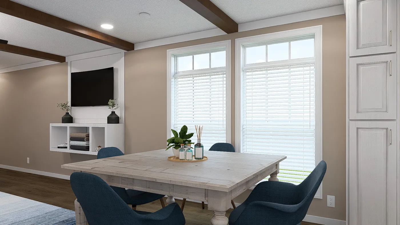 The THE DREAM Dining Area. This Manufactured Mobile Home features 3 bedrooms and 2 baths.