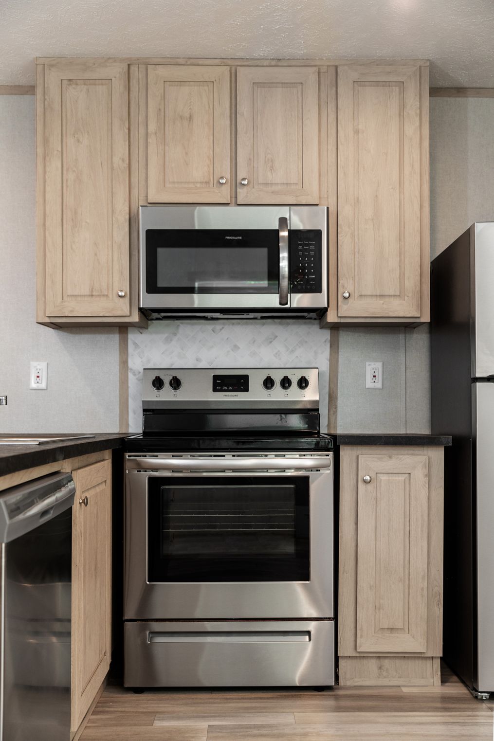 The BLAZER 48 A Kitchen. This Manufactured Mobile Home features 2 bedrooms and 1 bath.