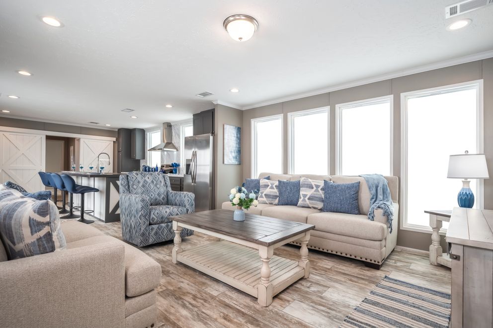 The MAJOR Living Room. This Manufactured Mobile Home features 3 bedrooms and 2 baths.