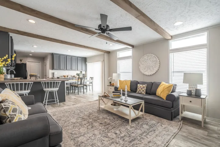 The ANNIVERSARY CHOICE Living Room. This Manufactured Mobile Home features 3 bedrooms and 2 baths.