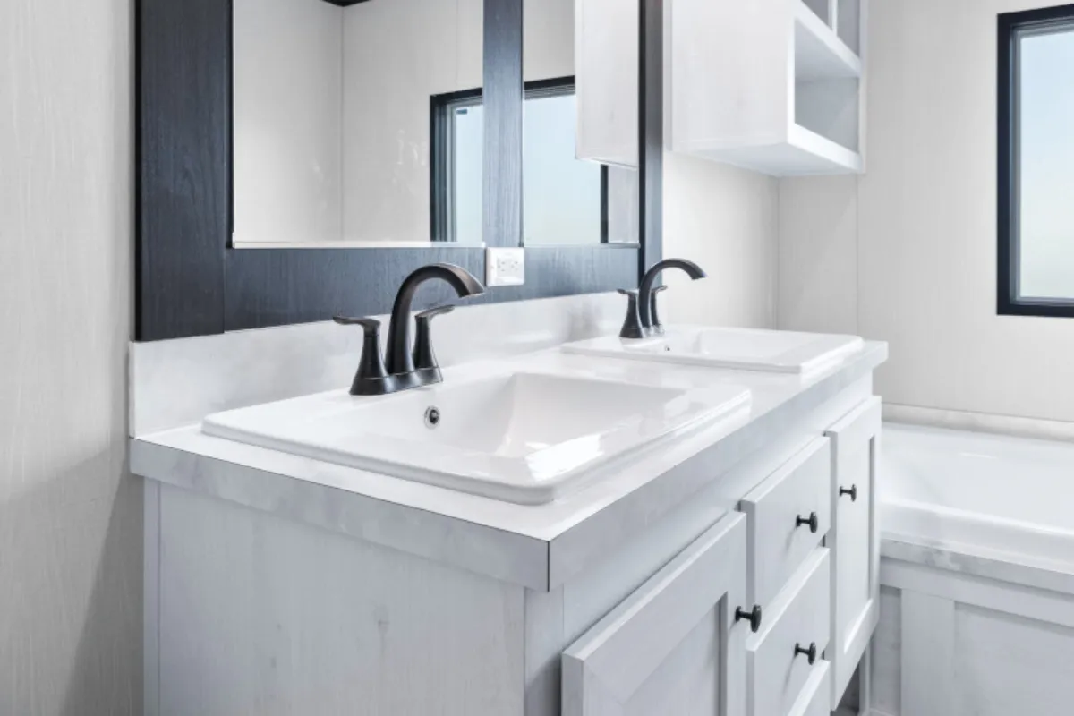 The ANNIVERSARY 16763S Primary Bathroom. This Manufactured Mobile Home features 3 bedrooms and 2 baths.