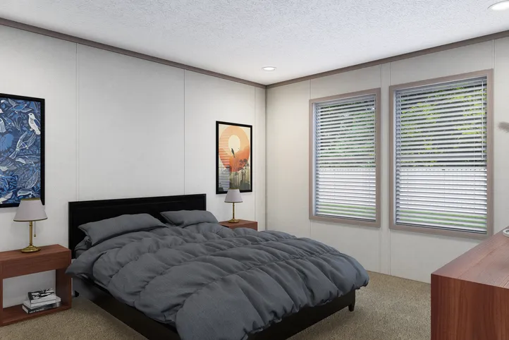 The 5228-E774P THE PULSE Primary Bedroom. This Manufactured Mobile Home features 3 bedrooms and 2 baths.
