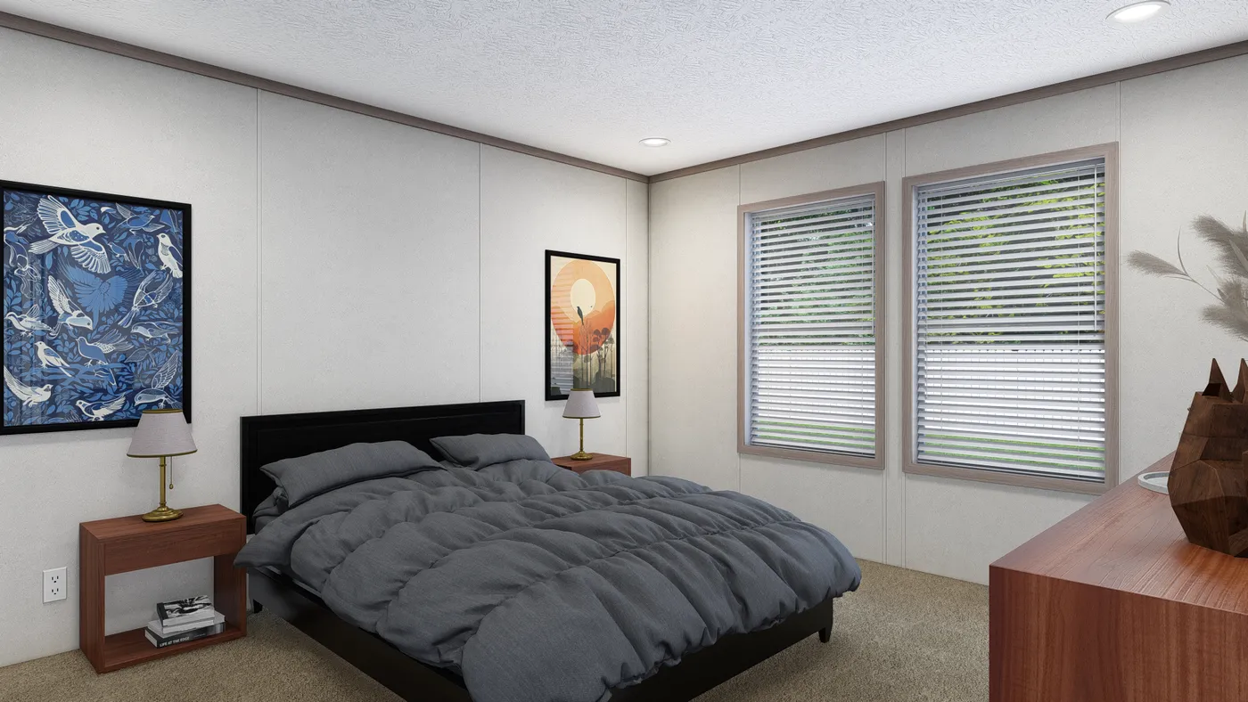 The 5228-E774P THE PULSE Primary Bedroom. This Manufactured Mobile Home features 3 bedrooms and 2 baths.