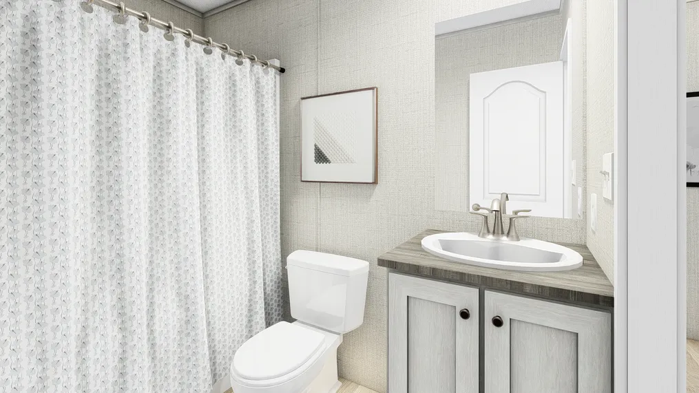 The COASTAL BREEZE I  16X72 Guest Bathroom. This Manufactured Mobile Home features 3 bedrooms and 2 baths.