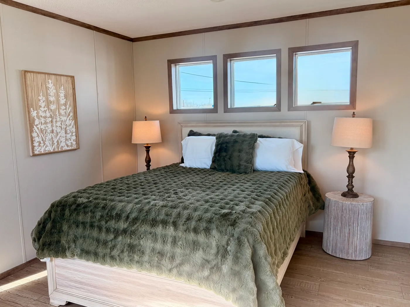 The HUDSON Primary Bedroom. This Manufactured Mobile Home features 3 bedrooms and 2 baths.