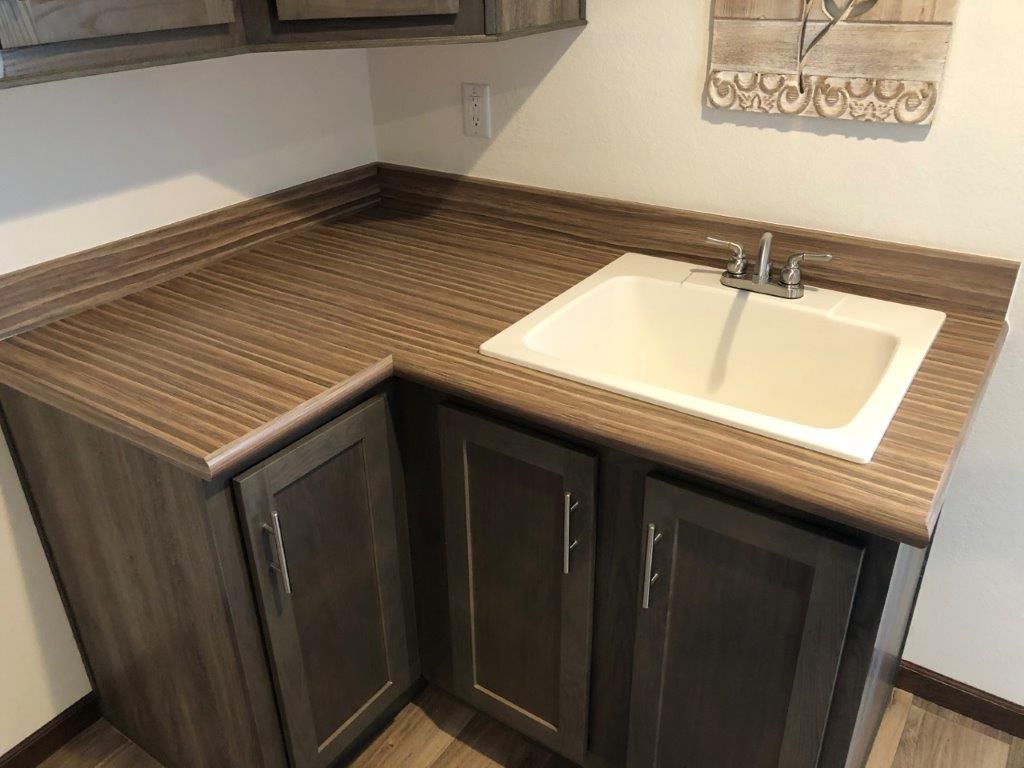 The LEGEND 572-1 MOD Storage. This Modular Home features 3 bedrooms and 2 baths.