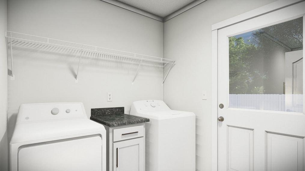 The THE PARKER Utility Room. This Manufactured Mobile Home features 3 bedrooms and 2 baths.