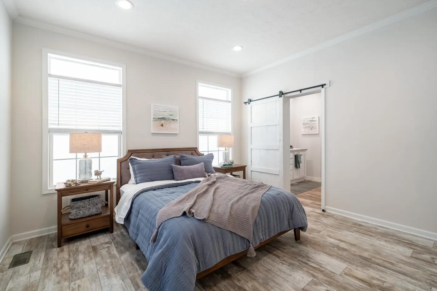 The 2889 THE COTTAGE HUD Primary Bedroom. This Manufactured Mobile Home features 3 bedrooms and 2 baths.