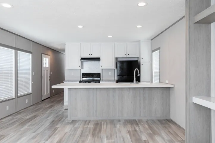 The BLAZER 66 F Kitchen. This Manufactured Mobile Home features 3 bedrooms and 2 baths.