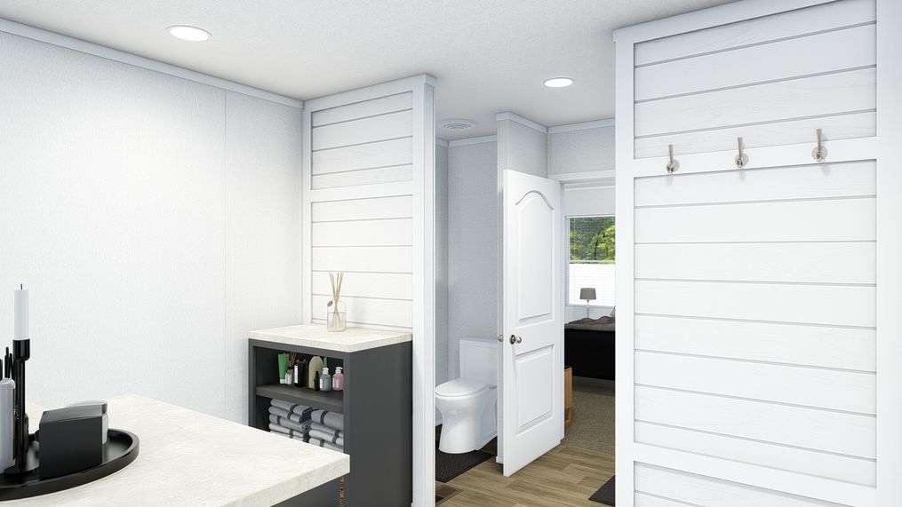 The ISLAND BREEZE 64 Primary Bathroom. This Manufactured Mobile Home features 4 bedrooms and 2 baths.