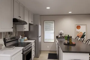 The BLAZER 66 F Kitchen. This Manufactured Mobile Home features 3 bedrooms and 2 baths.