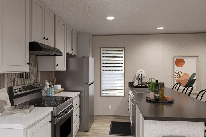 The BLAZER 66 F Kitchen. This Manufactured Mobile Home features 3 bedrooms and 2 baths.