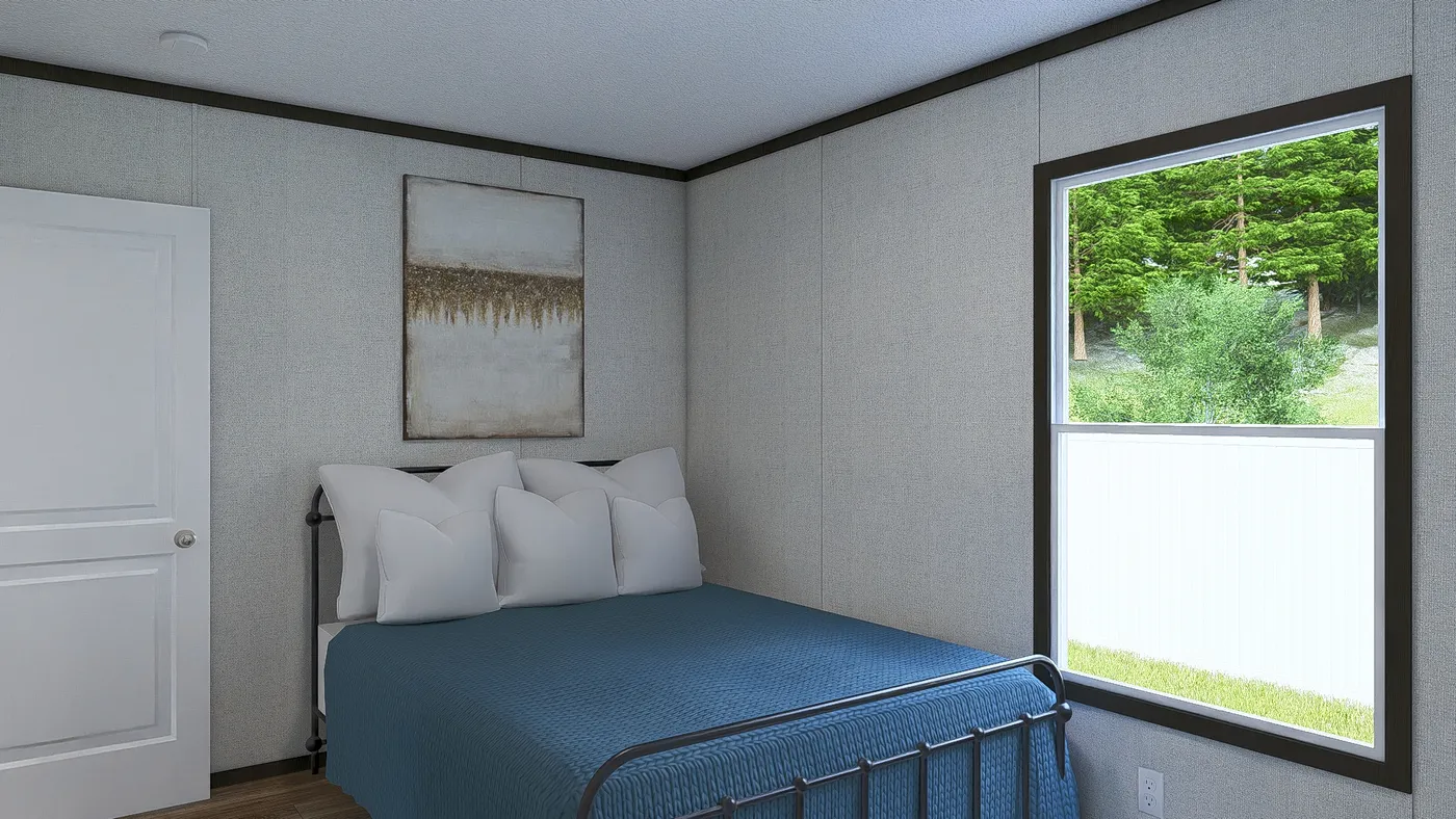 The SENSATION Guest Bedroom. This Manufactured Mobile Home features 3 bedrooms and 2 baths.